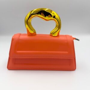 Orange Handbag with Gold Handle
